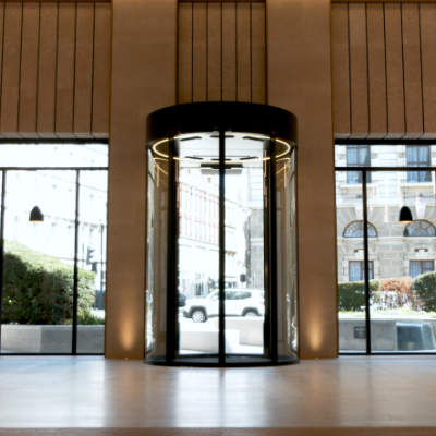 Circular Sliding Doors at the Old Bailey, London by OpenEntrances